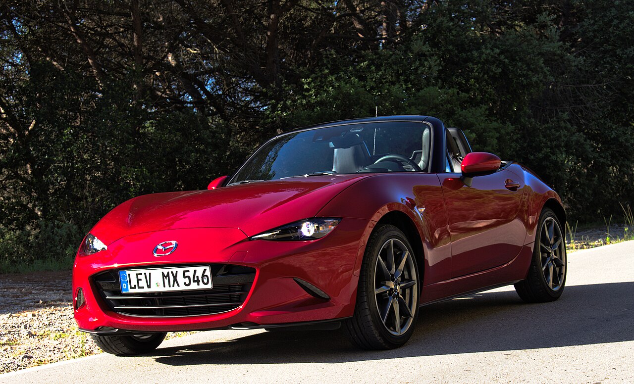 New vs Used: Mazda MX-5 vs Used Aston Martin Vantage vs Toyota GR86 vs Used Porsche Cayman — Same Budget, Very Different Thrills