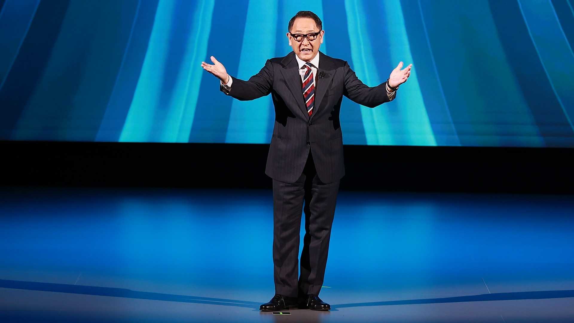Toyota Chairman Akio Toyoda speaking at an automotive conference